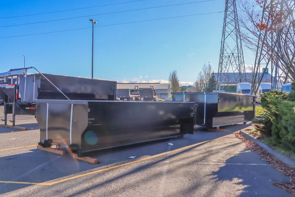 Roll-off dumpster ready for waste disposal at job site for 15 Yard Dumpster Rental in Scottsboro